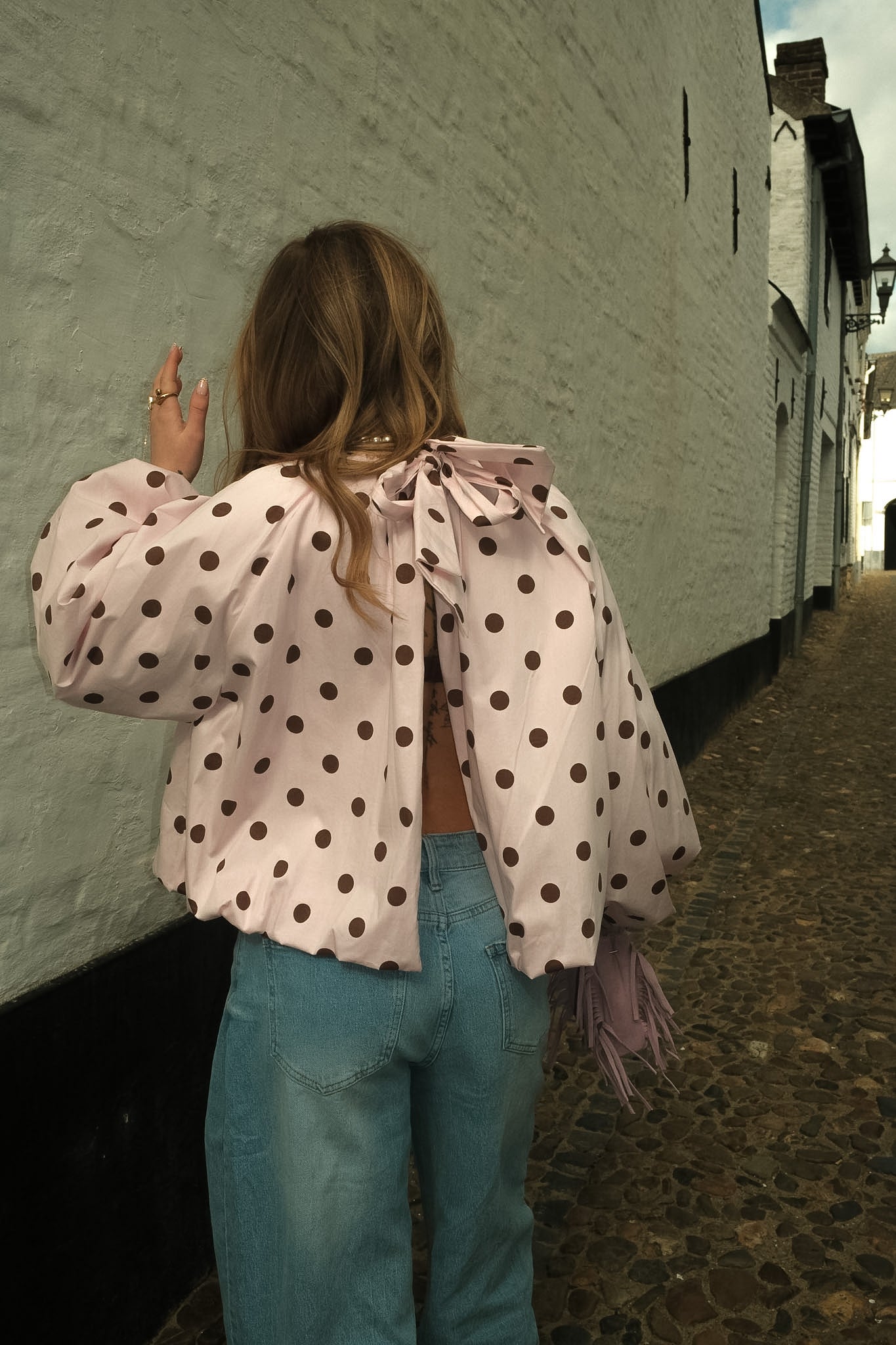 High-Neck Blouse with Open-Back Detail and Relaxed Fit