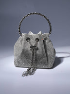 Crystal Embellished Silver Bucket Bag with Drawstring Closure and Top Handle