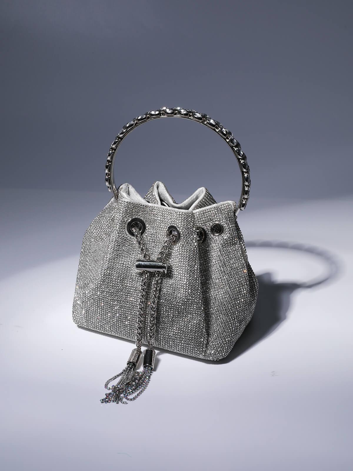 Crystal Embellished Silver Bucket Bag with Drawstring Closure and Top Handle