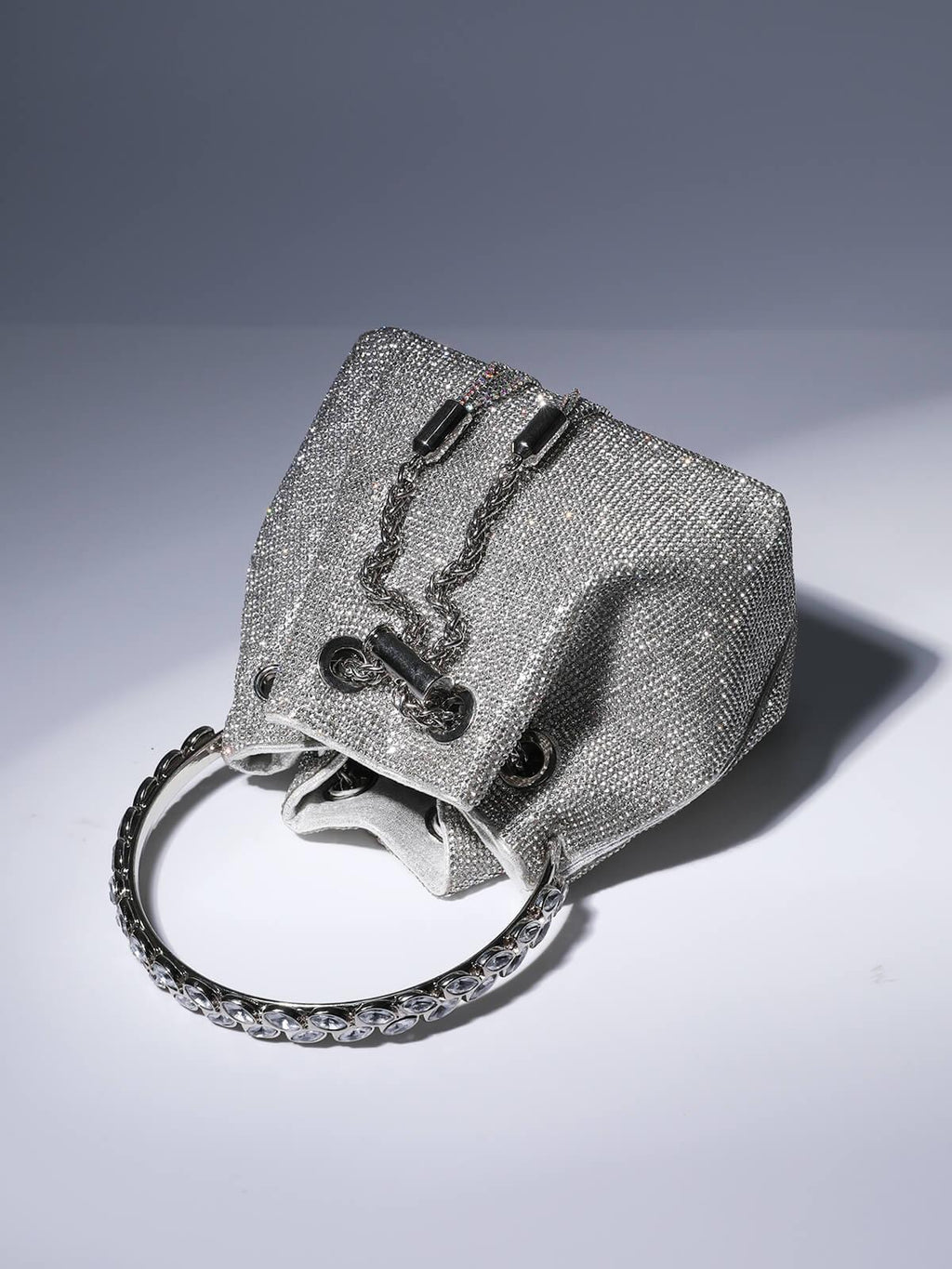 Crystal Embellished Silver Bucket Bag with Drawstring Closure and Top Handle