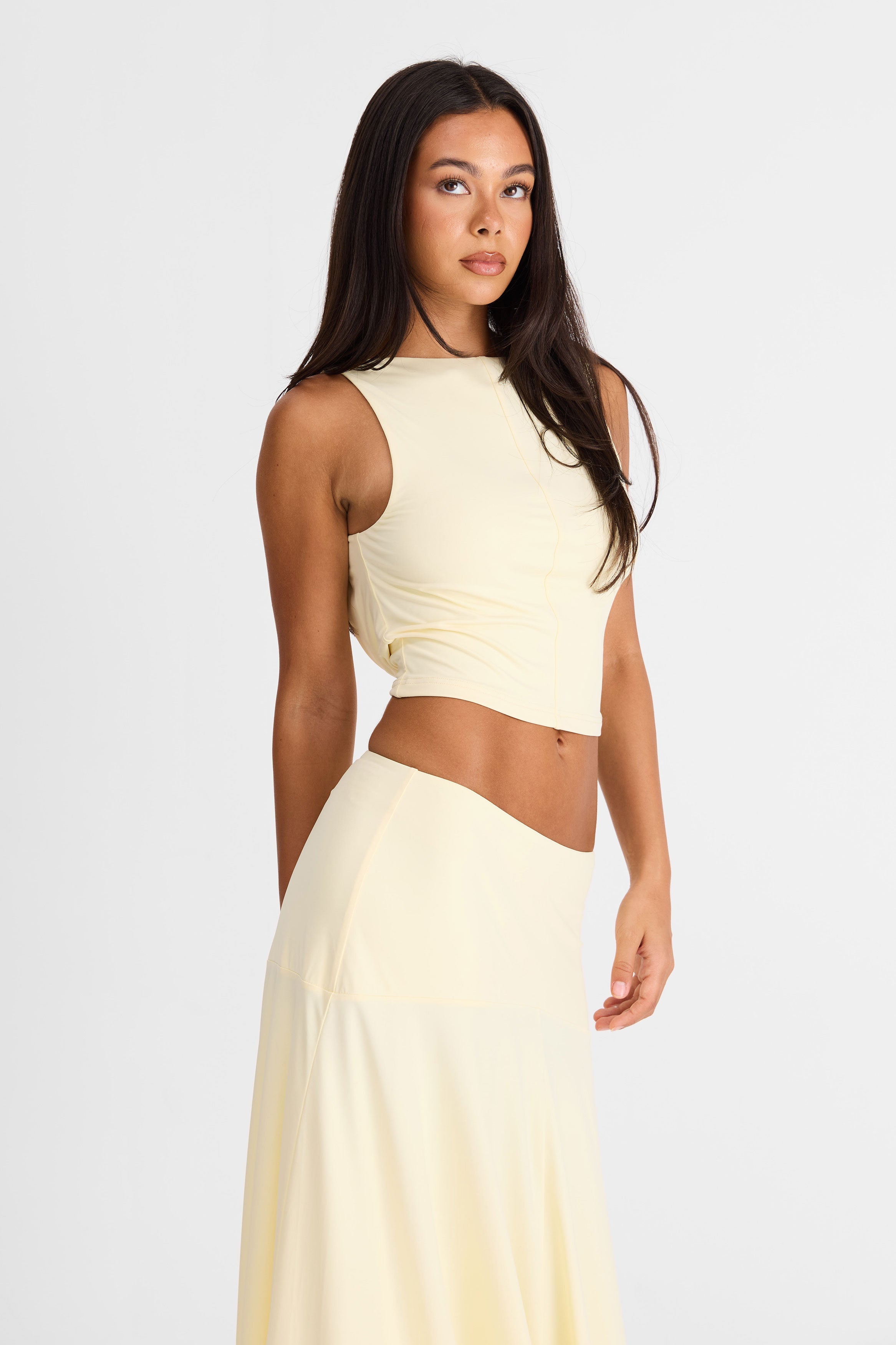 Sleeveless Jersey Top with High Neckline and Open Back Detail
